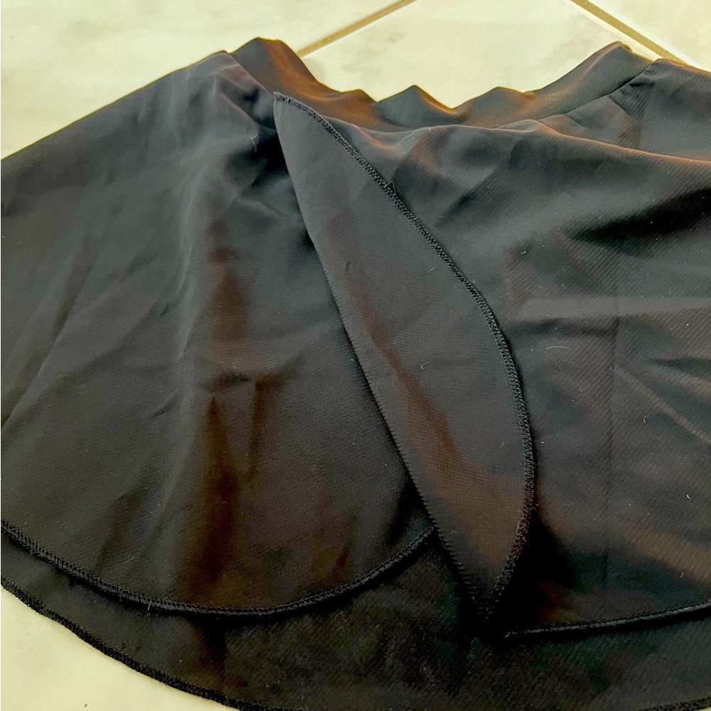 Black dance skirt. New without tags.